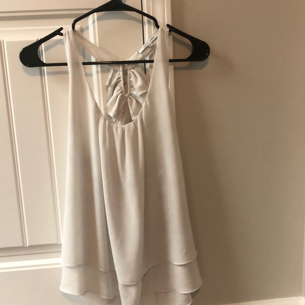 White classy tank. Worn maybe 3 times.